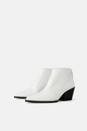 Coole Stiefel in Cowboy-Stil mit der Wirkung von Krokodilhaut können der Preis von 7999 Rubel bei Zara, erworben werden. Sie können mit Kleidern, stilvoller Hose mit Leopardenmuster getragen werden